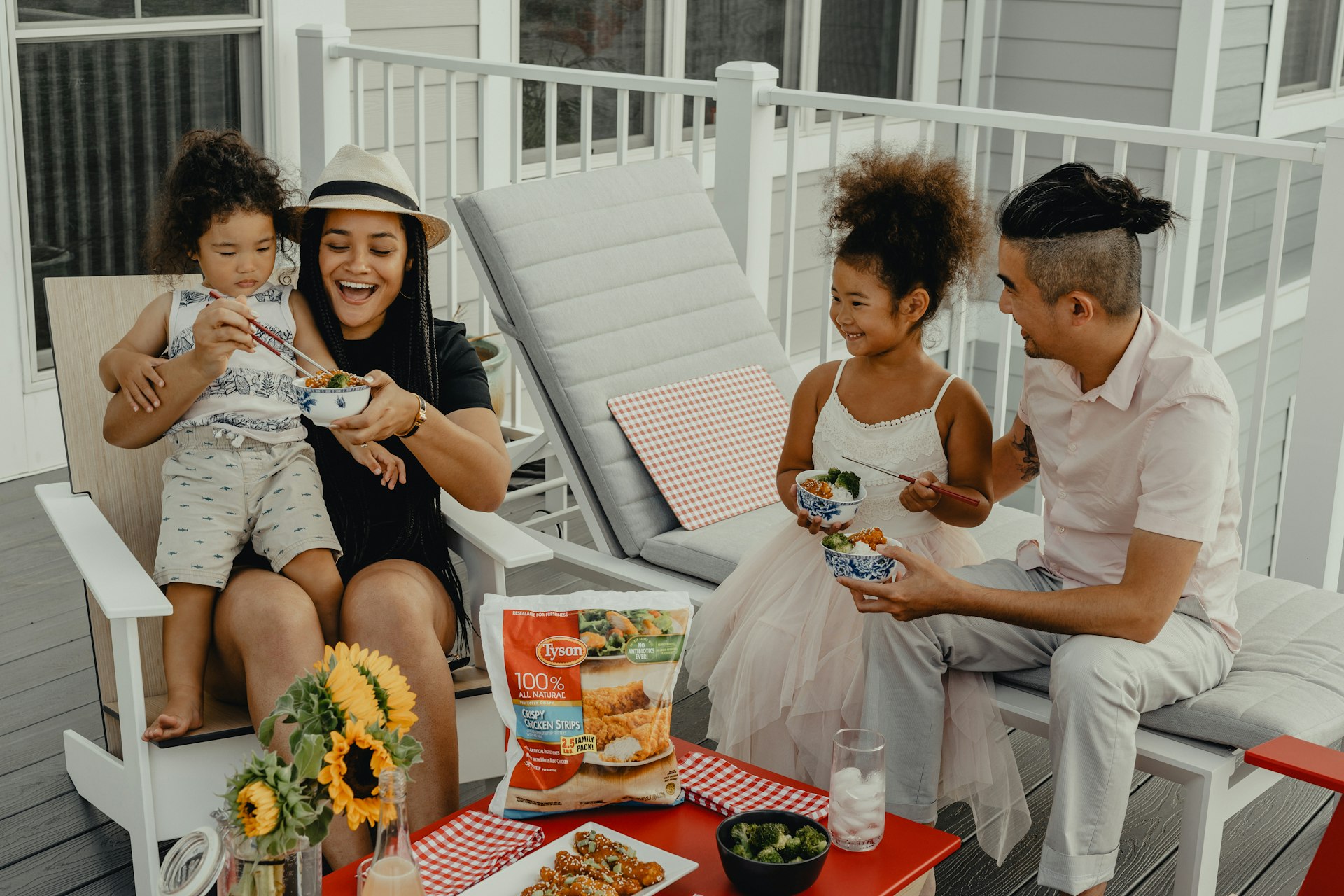 family on their new deck porch
